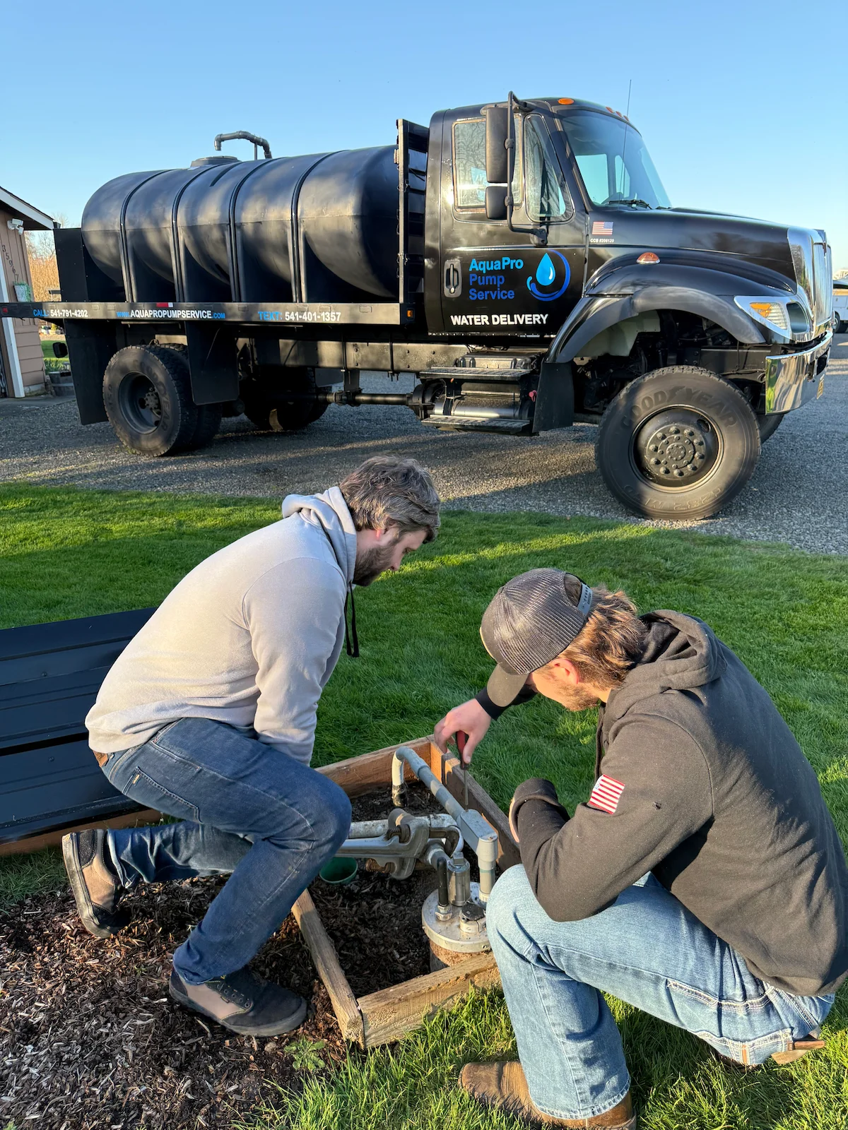 Aqua Pro Pump Service team working on a well