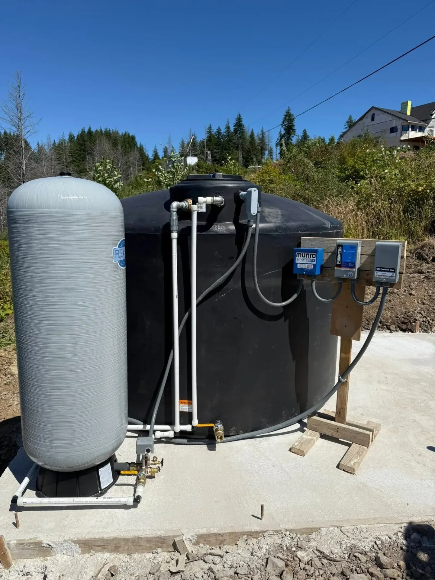Technician repairing a well pump in rural Oregon